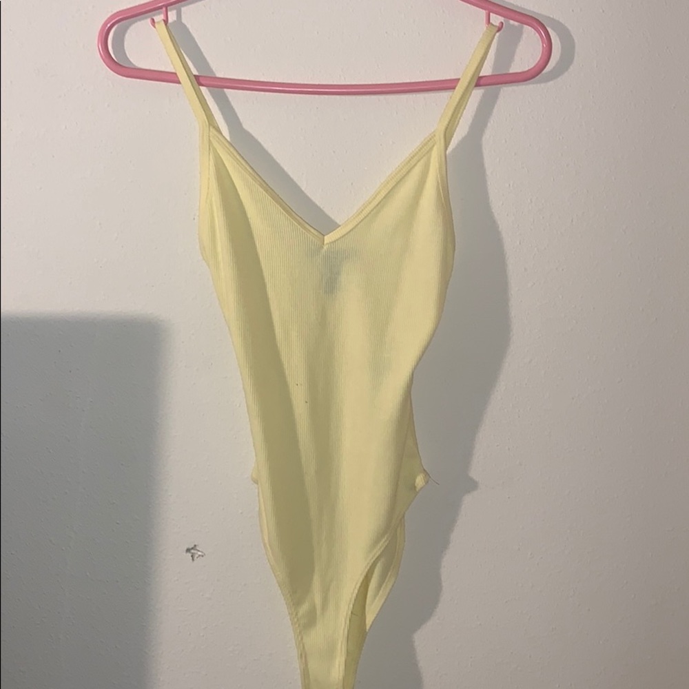Yellow bodysuit